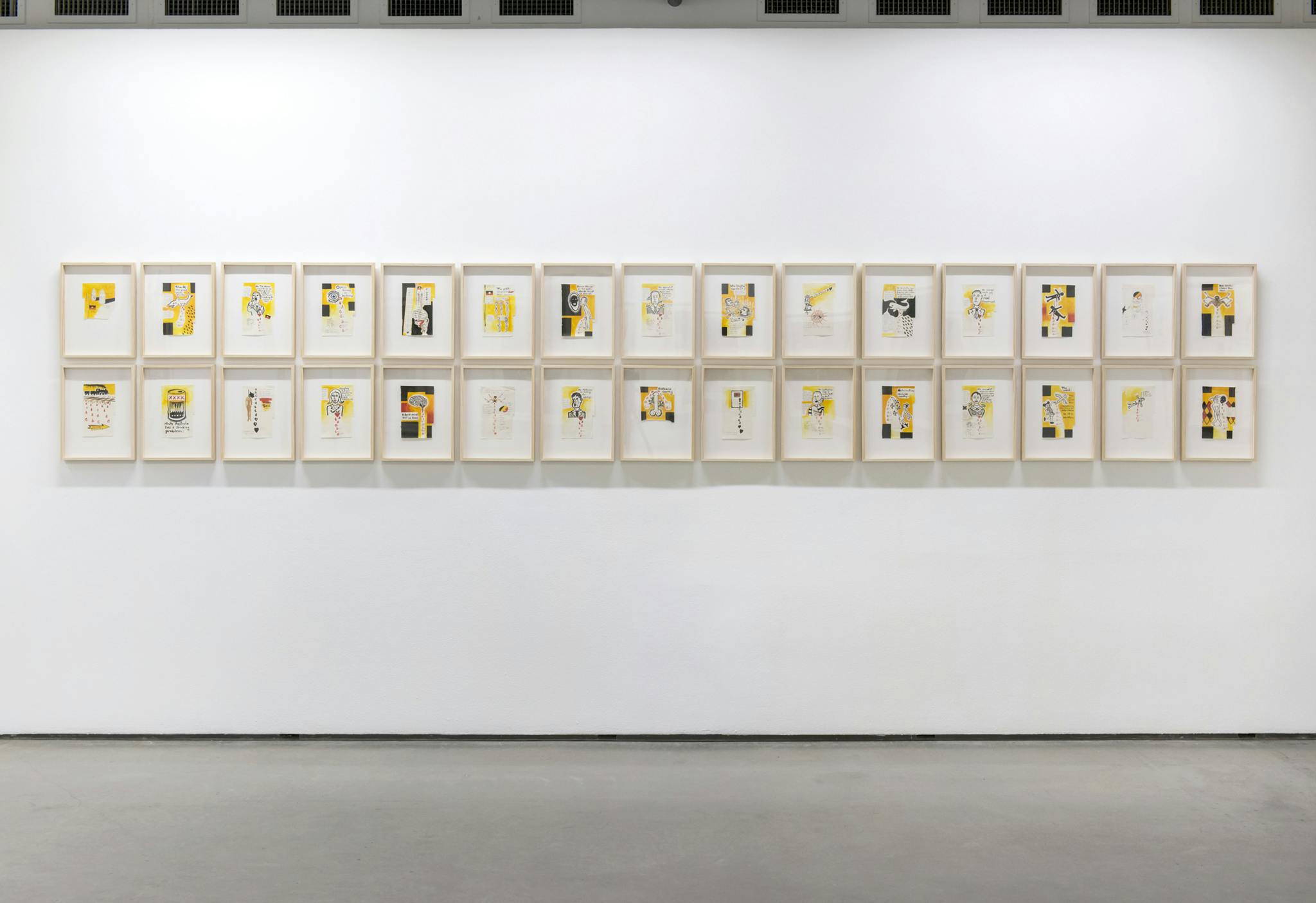 Thirty small, framed works on paper hang in two rows of fifteen on the wall of a gallery space. The colour scheme of all the works are dominated by yellow, black and orange.  