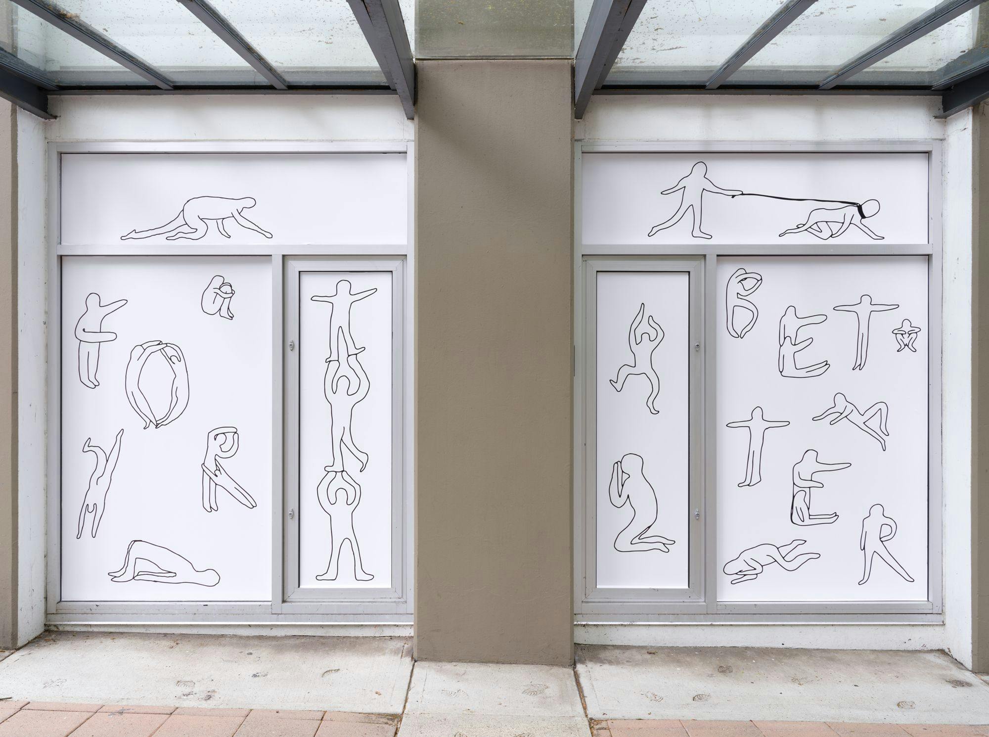 A pair of windows featuring line drawn figures engaged in various activities. Some of the figures spell out “for” and “better” with their bodies.